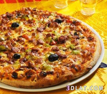 طريقه عمل البيتزا2024،طريقه عجن البيتزا،طريقه البيتزا بالصور،بيتزا السبانخ،بيتزا