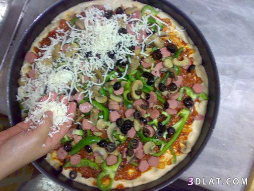 طريقة عمل البيتزا الشهية,طريقة تحضير بيتزا لذيذة,بيتزا لذيذة و سهلة,بيتزا بالسجق