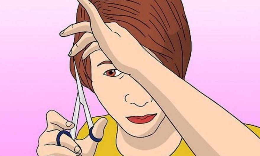 Woman shaving her head