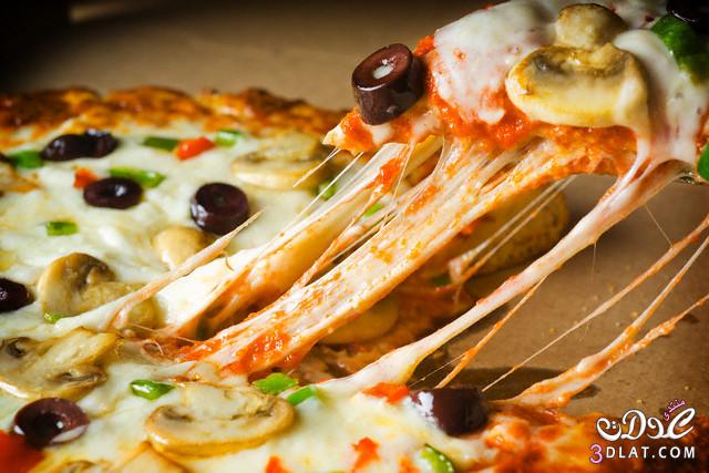 البيتزا بالبروكلي والبارميزان طريقة تحضير بيتزا البروكلي والبارميزان بيتزا البرو