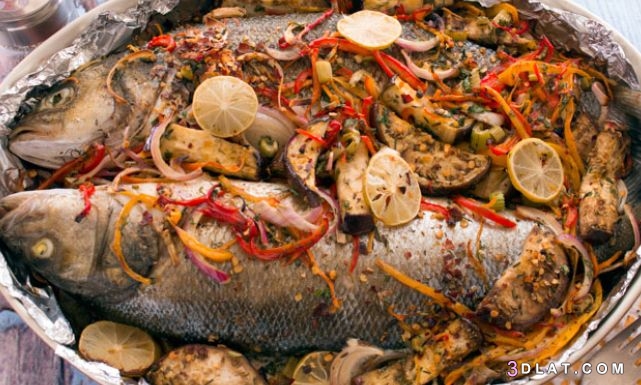 طريقة عمل صينية السمك المشوي في الفرن،تحضير السمك المشوي في الفرن بأسهل الط