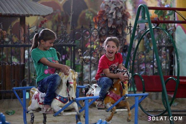 صورأطفال في العيد يلعبون ويمرحون،صور أطفال جميلة في العيد، صوربنين وبنات.