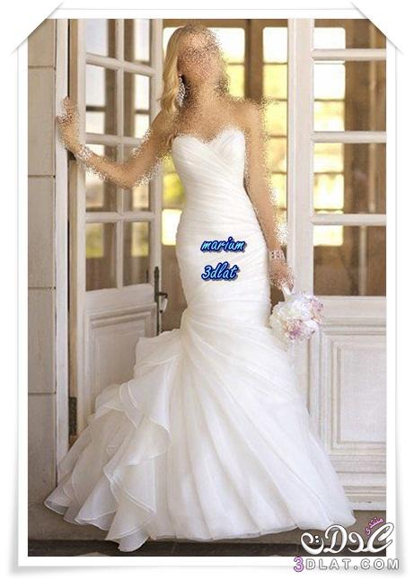 بالصور: تألقي يوم زفافك بفستان زفاف بسيط ومميز.