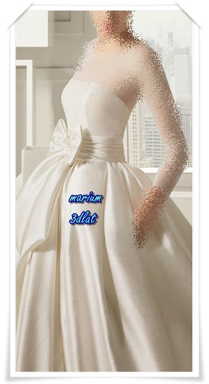 بالصور: تألقي يوم زفافك بفستان زفاف بسيط ومميز.