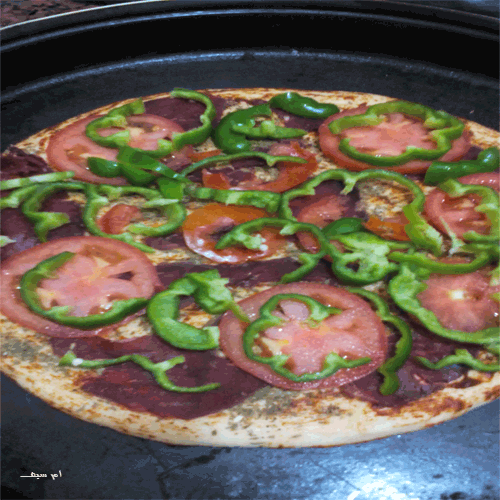 طريقة عمل بيتزا بالبسطرمةمن مطبخى 2024 طريقة عمل البيتزا بمكونات سهلة 2024