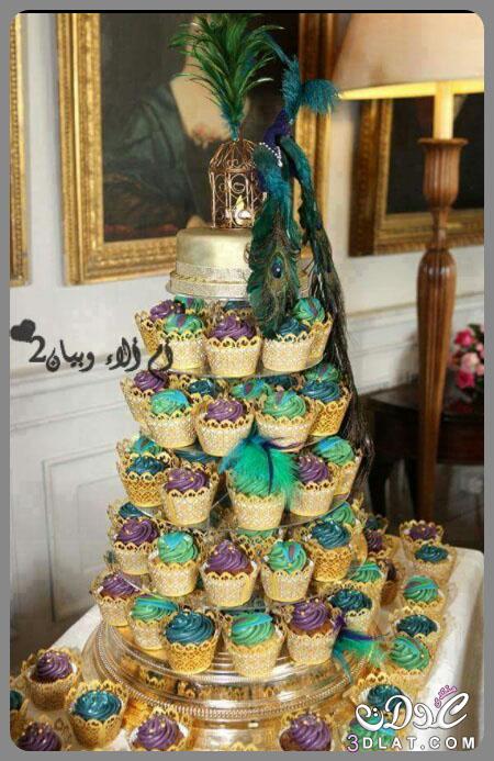 تورتات لحفلات الزفاف على شكل الطاووس,اجمل كيكات لافراح 2024 على شكل طاووس